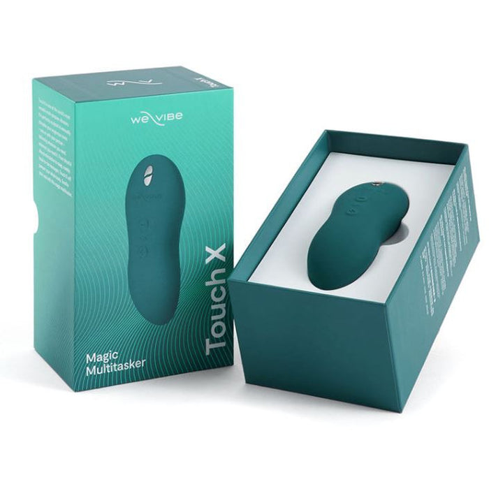 palm size massager teal in box
