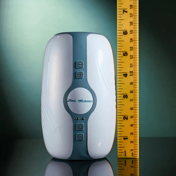 white & green masturbator in white sleeve, beside height chart 6"