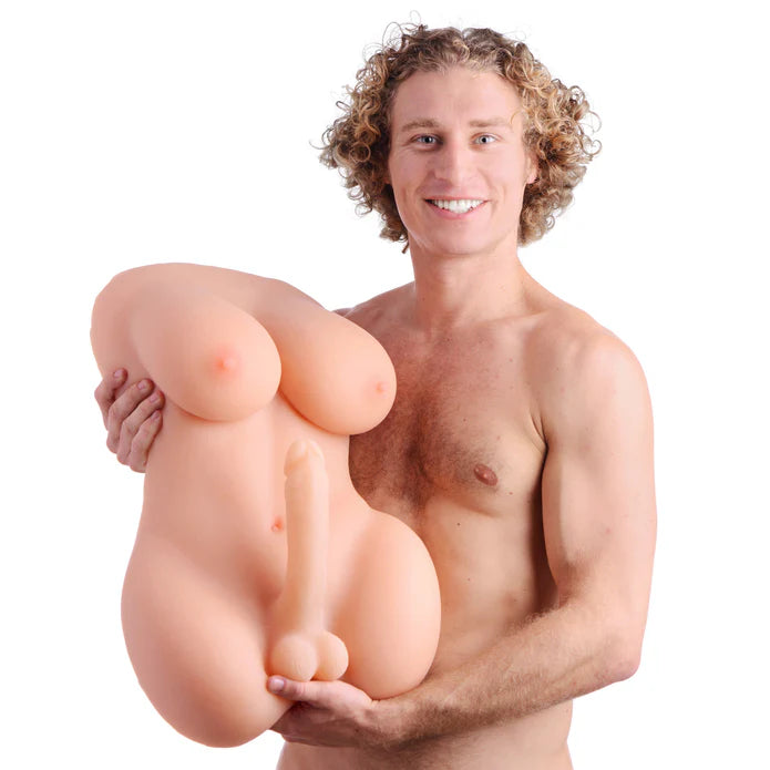 Man holding a realistic silicone model of a transgender body on a white background