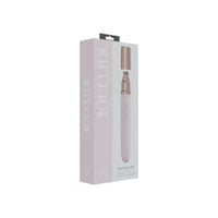sleek vibrator with removable cap to look like perfume pink