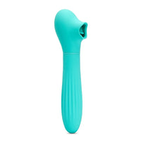 Turquoise handheld massager on a white background