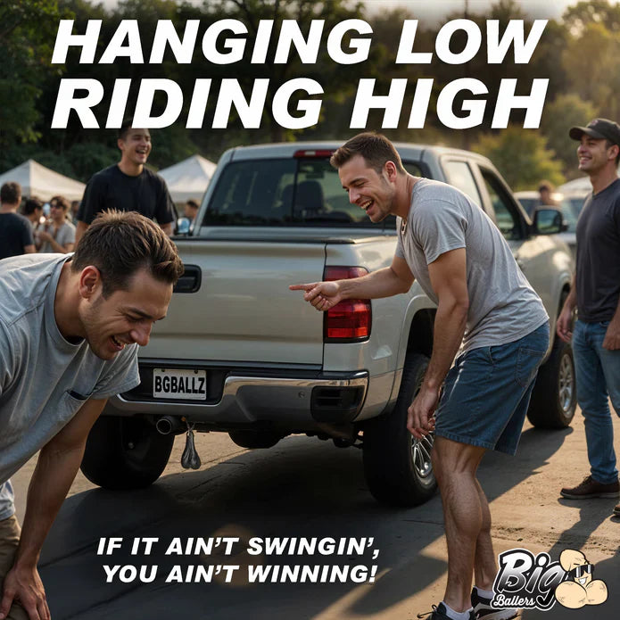 Two men leaning against a truck with text 'Hanging Low Riding High' and 'If it ain't swingin', you ain't winning!' in front of a crowd.