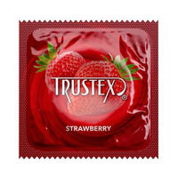 Red Trustex strawberry-flavored condom packaging with strawberries on a white background