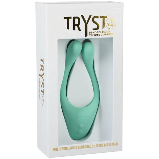 a white display box showing off a green "frog legs" shaped vibrator.