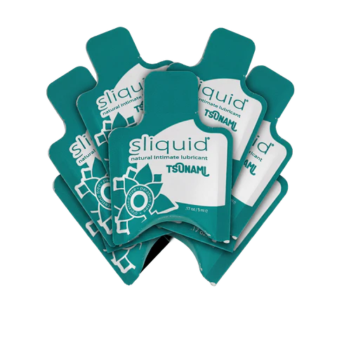 Multiple packages of sliquid tsunami natural intimate lubricant on a white background