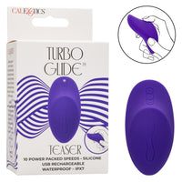 hand held palm massager with tv shape end for clitoral stimulation, in purple, beside box packaging
