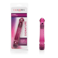 a transparent purple vibrator with a studded shaft and mushroom capped tip, shown next to its plastic display packaging
