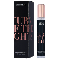 black label, with rose gold writing on clear roll on bottle.  beside black box packaging, turn the lights off scent