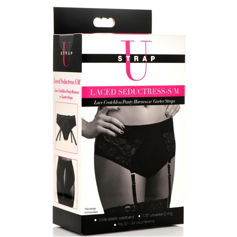 box packaging with laced strap on harness in black