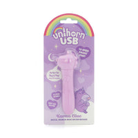 vibrating purple bullet with unicorn head, bumpy main and tongue sticking out in plastic packaging