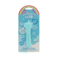 vibrating blue bullet with unicorn head, bumpy pain and tongue sticking out in plastic packaging
