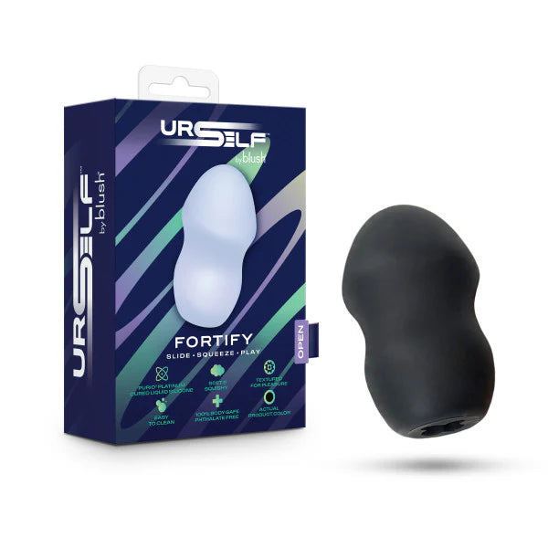 Black silicone stroker next to its packaging with 'URSELF' branding on a white background