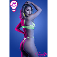 Model wearing a neon green bikini against a blue background, featuring 'Fantasy' branding.