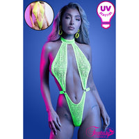 Model wearing a neon green UV reactive teddy against a purple background