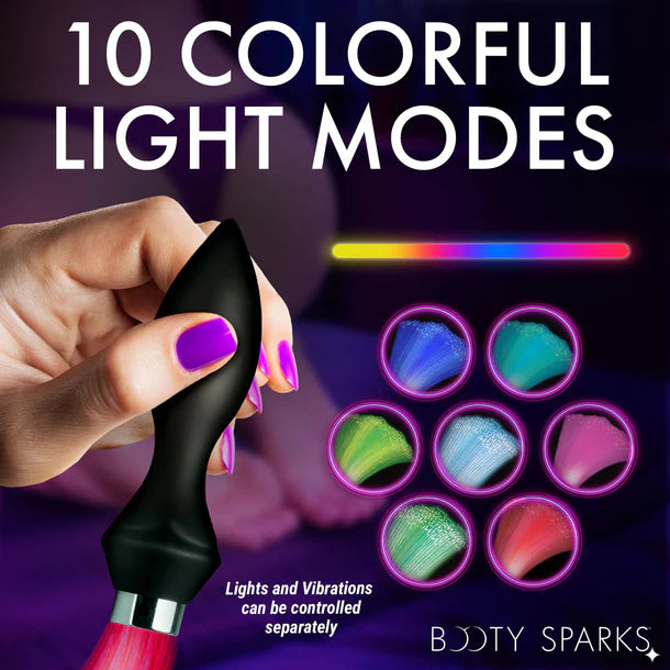 Hand holding a black and red device with colorful light modes displayed, featuring 'Booty Sparks' branding.