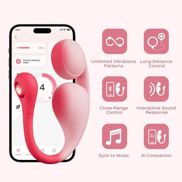 Pink silicone intimate massager shown on a smartphone screen with feature icons beside it, including unlimited vibration patterns, long-distance control, close-range control, interactive sound response, sync to music, and AI companion, on a pale pink background.
