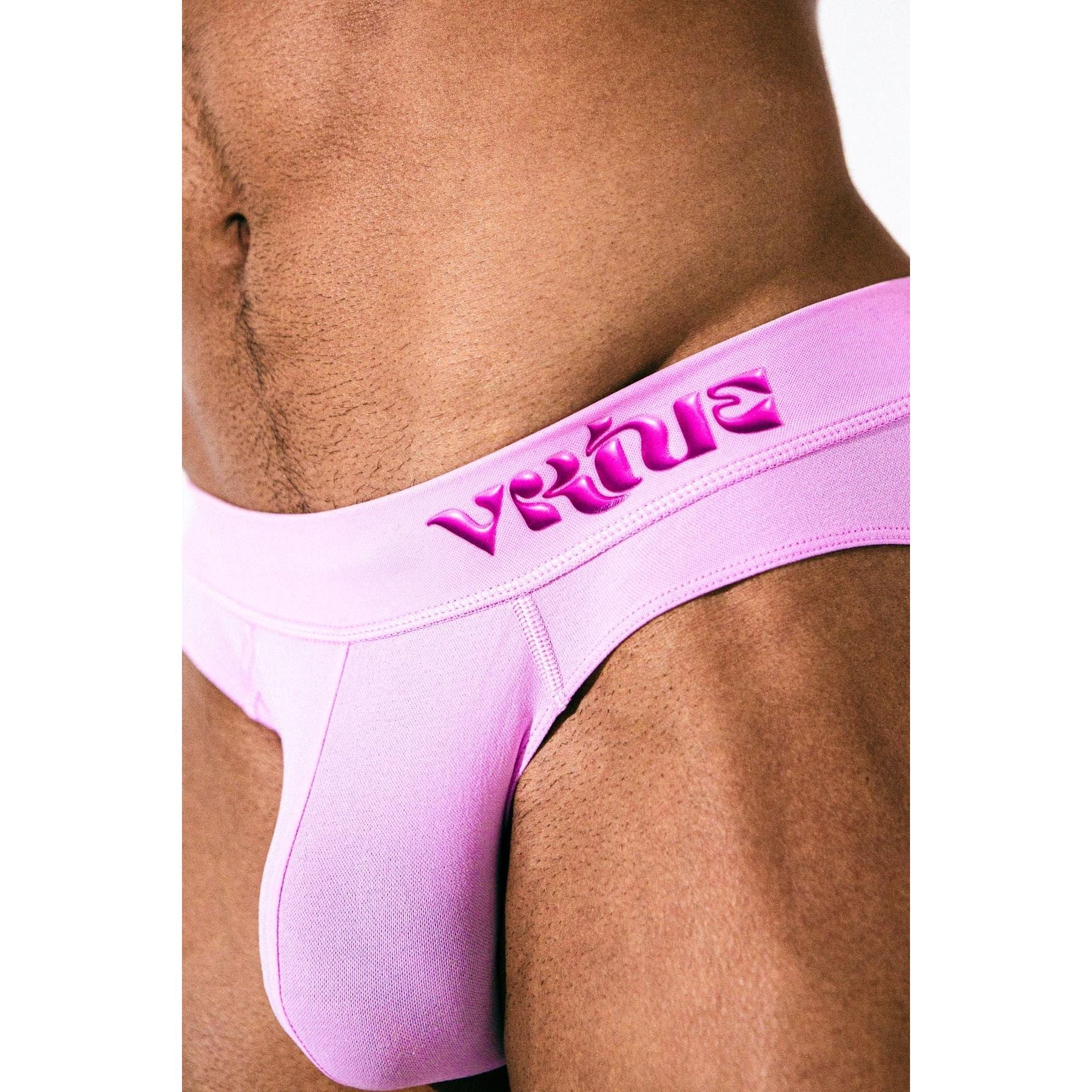 a man wearing a pink jockstrap 