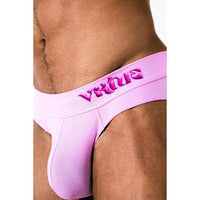 a man wearing a pink jockstrap 