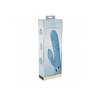 Blue vibrator device in a gold and white box on a white background