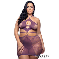 Woman wearing a purple lace lingerie set with 'Fantasy Lingerie' branding on a white background.
