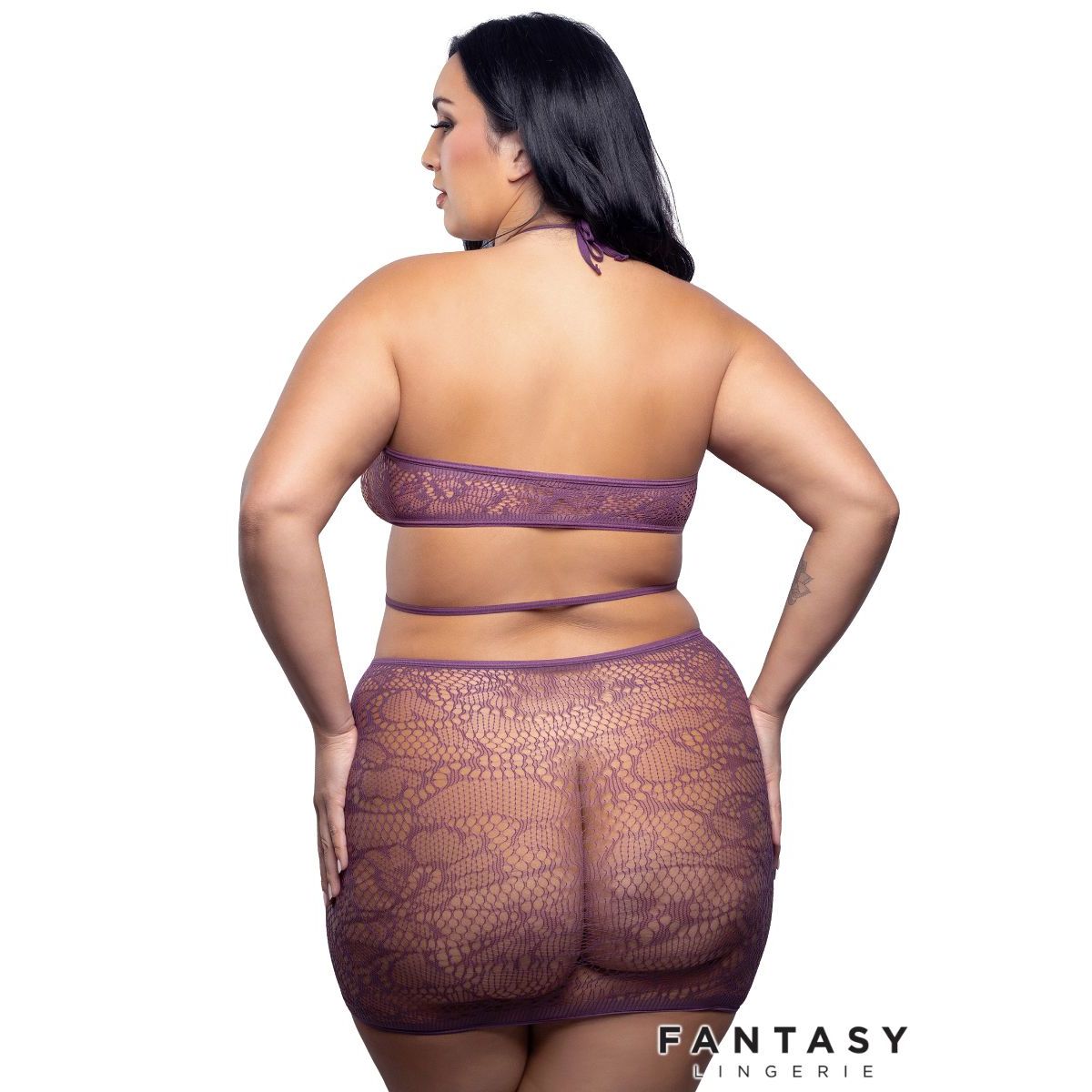 Woman wearing a lace lingerie set with 'Fantasy Lingerie' branding.