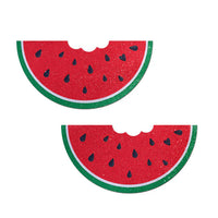 watermelon slice with a bite taken out of the top pasties