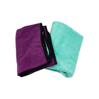 Two folded waterproof throws, one purple and one green, on a white background