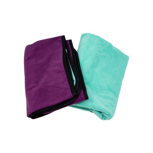Two folded waterproof throws, one purple and one green, on a white background