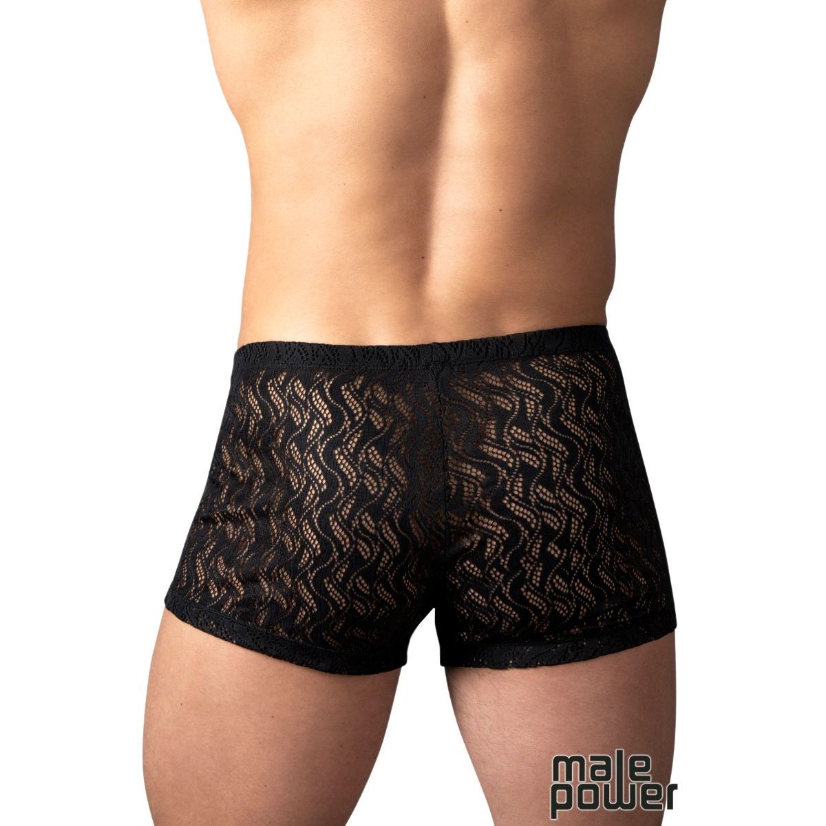 Rear view of a male model wearing black lace boxer briefs with a wavy pattern, on a white background.