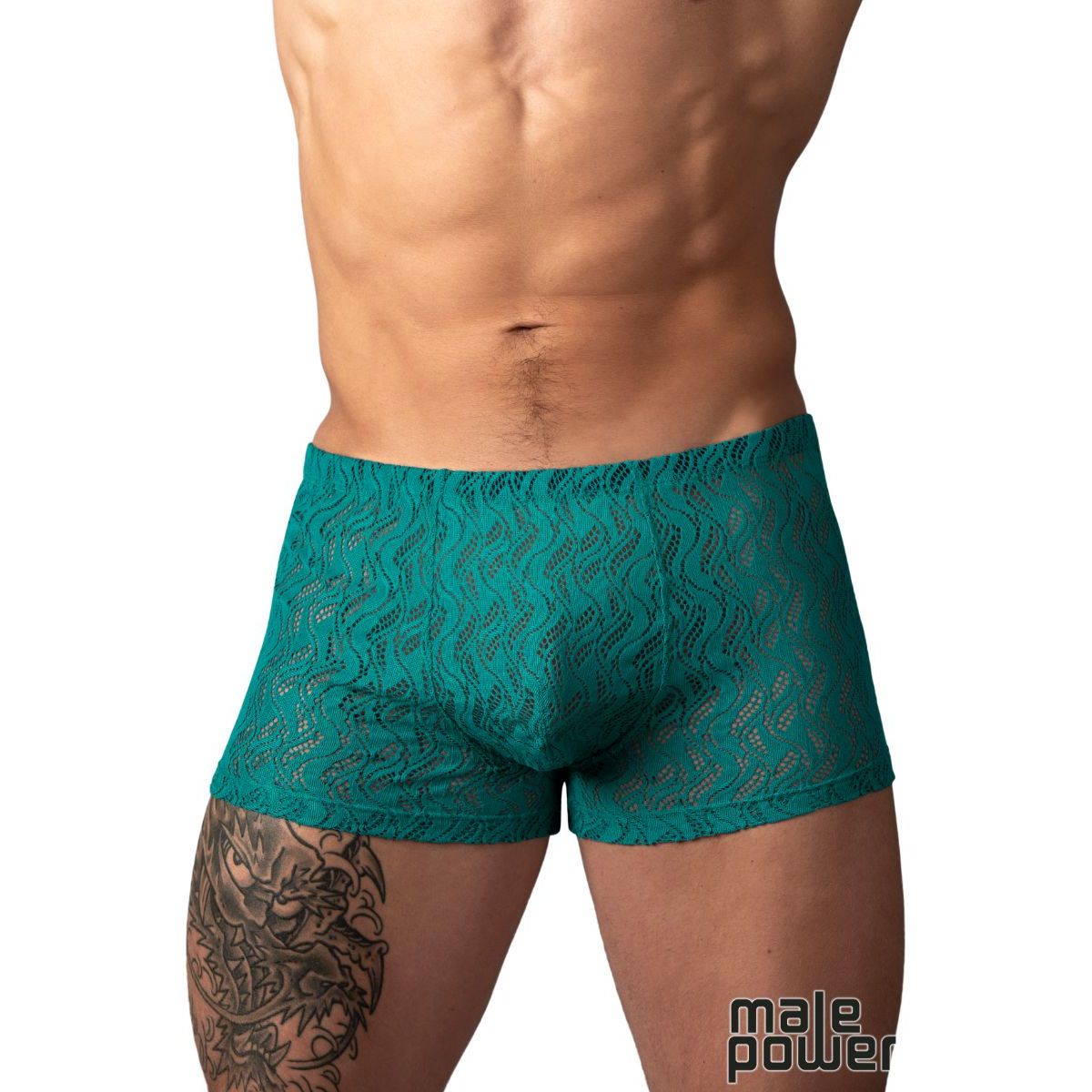 A close-up of a male model's lower torso wearing teal lace boxer briefs against a plain white background. The brand name 'male power' is visible as a watermark in the bottom right corner.