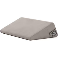 Gray wedge pillow with a liberator logo on a white background