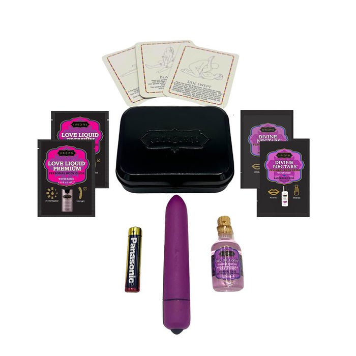 purple vibrator, raspberry body glide, love liquid body glide, oil of  love massage oil and battery, with metal tin and 3 playing cards