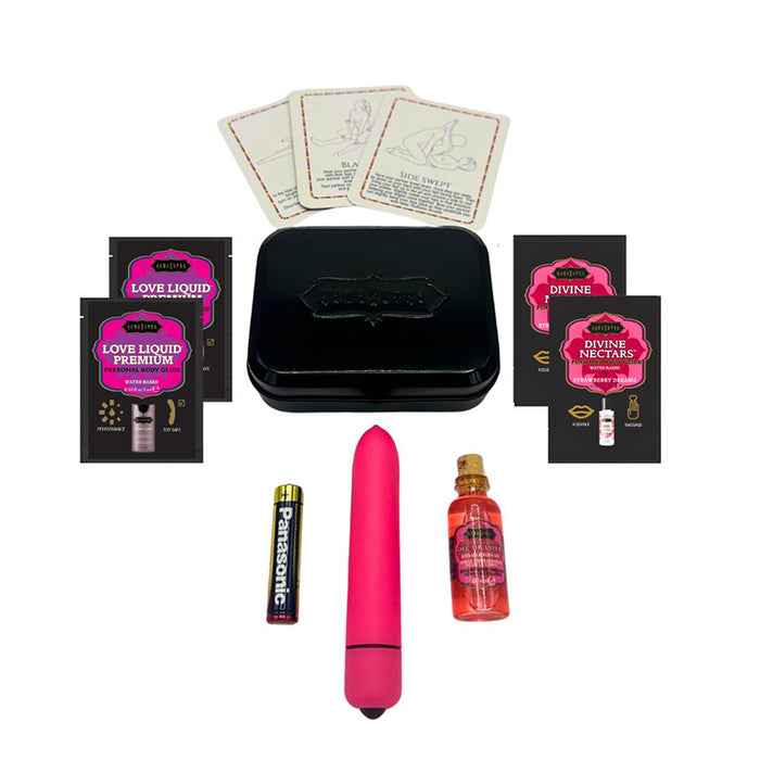 pink vibrator, battery, strawberry glide, love liquid premium glide, oil of love massage oil, black tin and 3 playing cards