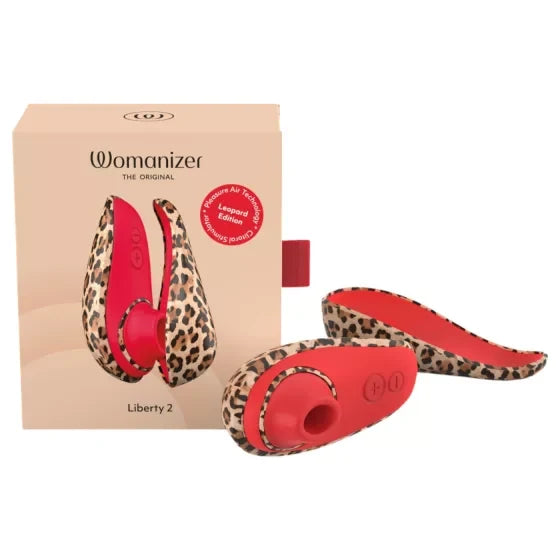 leopard and red womanizer liberty 2 vibrator beside packaging