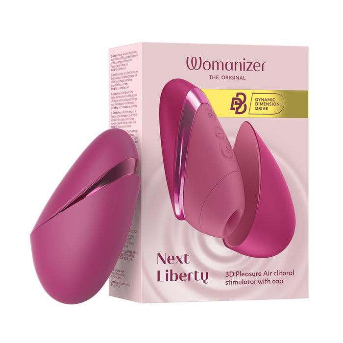 A pink and magenta personal massager named 'Womanizer Next Liberty' shown next to its retail packaging box on a plain white background.