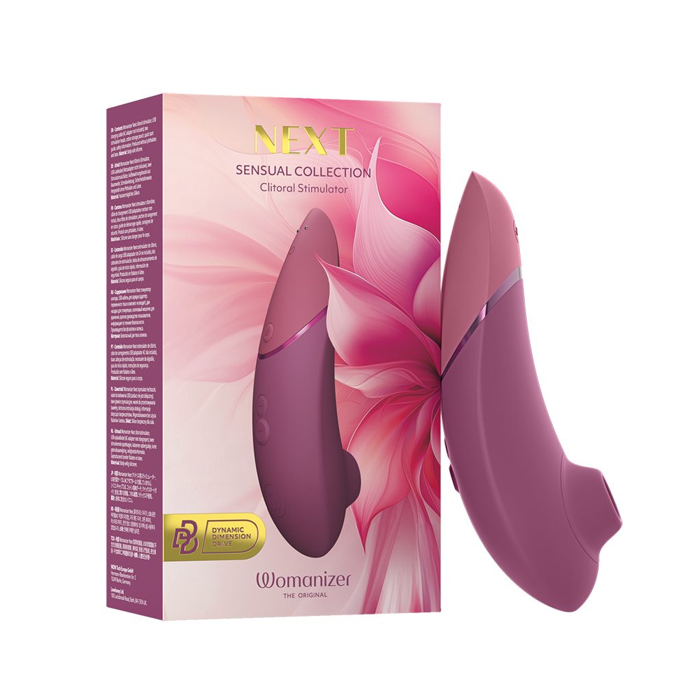 Womanizer next clitoral vibrator with packaging on a white background