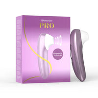 Womanizer Pro product with packaging on a white background