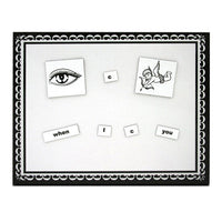 Educational game board with eye illustration, letter cards, and decorative border