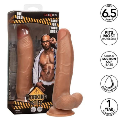 a brown detailed penis shaped dildo with balls and a suction cup. Shown next to its display box the shows a black man wearing a suit with an open shirt