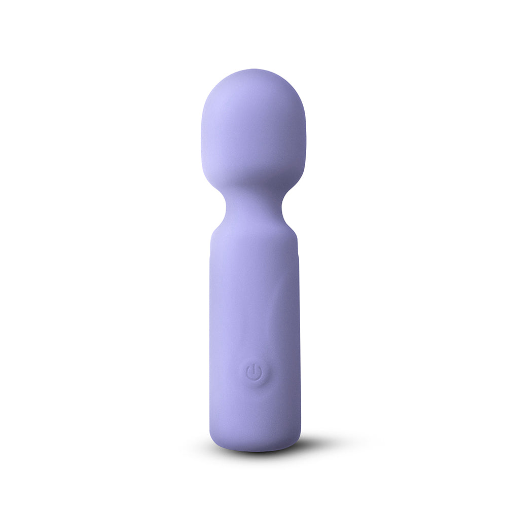 A lavender purple personal massager with a rounded head and cylindrical body, featuring a subtle power button icon on the front, set against a plain white background.