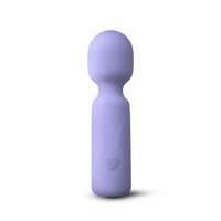 A lavender purple personal massager with a rounded head and cylindrical body, featuring a subtle power button icon on the front, set against a plain white background.