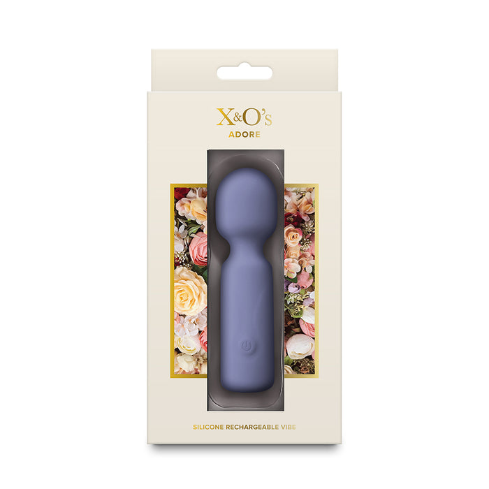 X&O's Adore silicone rechargeable vibrater in its original cream-colored retail packaging, featuring a floral window design.
