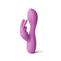 A pink silicone personal massager shaped like a stylized hand, standing upright on a plain white background.