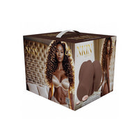 A square retail display box for Xkin adult novelty items, featuring printed images of a woman, tufted upholstery, and two realistic-looking brown bootie-shaped items on the front panel, set against a plain white background.
