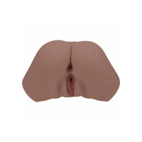 A realistic silicone butt masturbator with a textured, flesh-toned surface, shown from a top-down view on a plain white background.