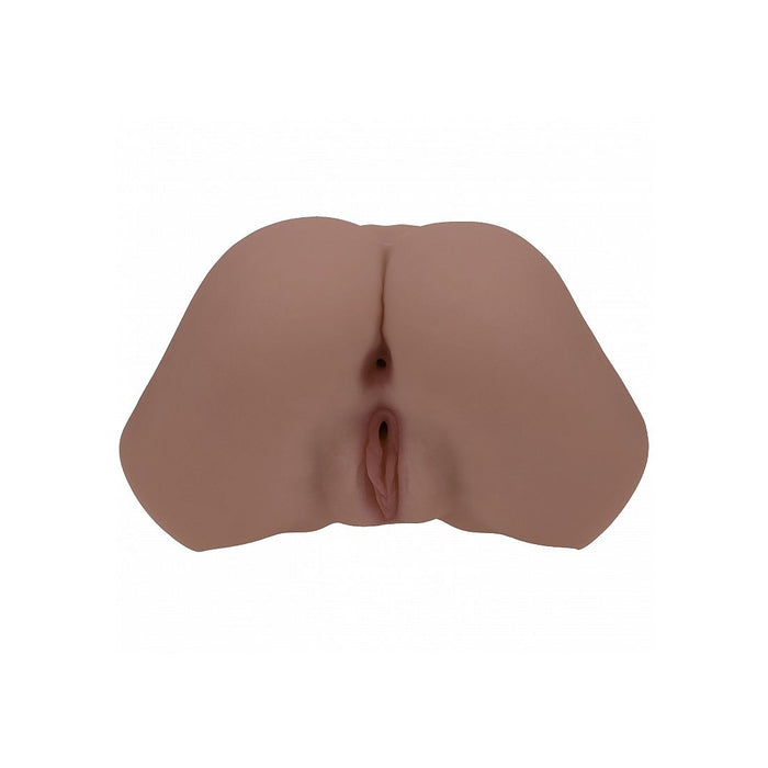 A realistic silicone butt masturbator with a textured, flesh-toned surface, shown from a top-down view on a plain white background.