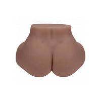 A realistic flesh-toned silicone butt masturbator photographed against a plain white background.