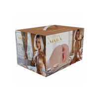 Xkin Beauty silicone breast implant kit in its original retail packaging, featuring a brown cardboard box with gold lettering and images of a model.