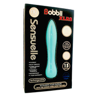 a teal vibrator with a flared head and pointed tip shown within its black display box