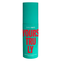 green bottle of spray pheromone body mist in yours truly 3.35 oz size